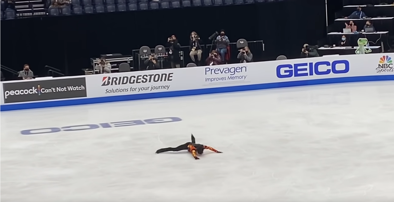 Screenshot of Nathan Chen's step sequence fall during the 2022 US National Championships